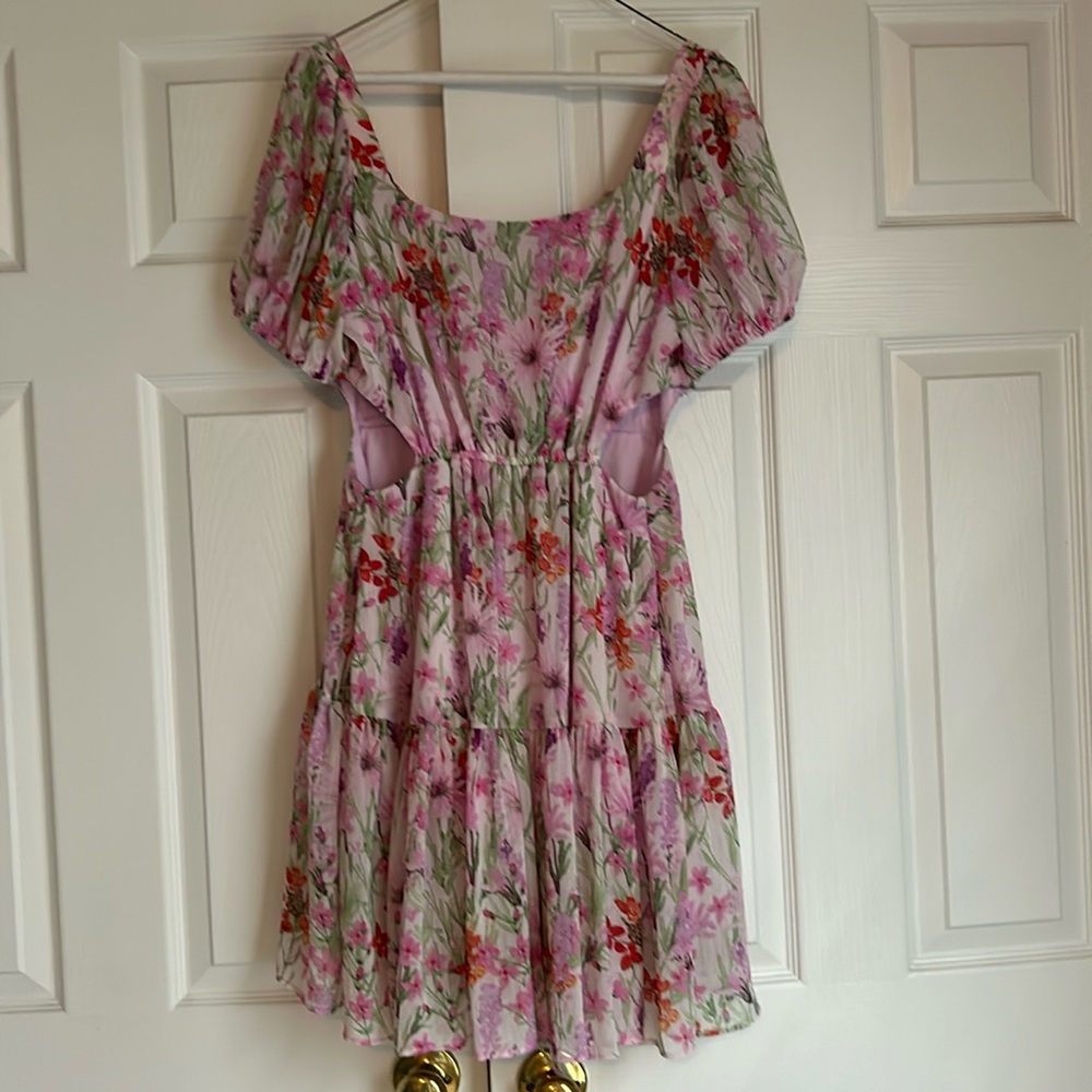 Darling floral dress with cut outs and adjustable waist with tie